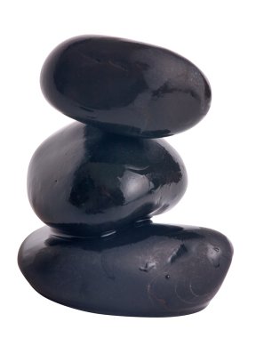 beyaz zemin üzerinde üç ıslak taşlar