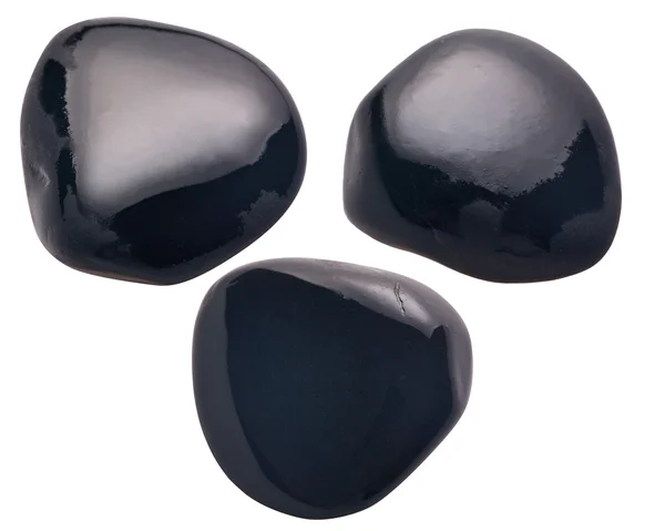 Colección de tres piedras negras mojadas — Foto de Stock