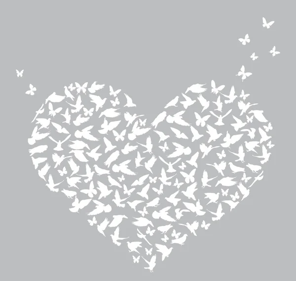 Símbolo del corazón formado por mariposas blancas y pájaros — Vector de stock