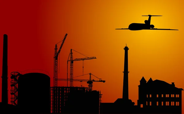 Avion au-dessus de la ville industrielle au coucher du soleil — Image vectorielle