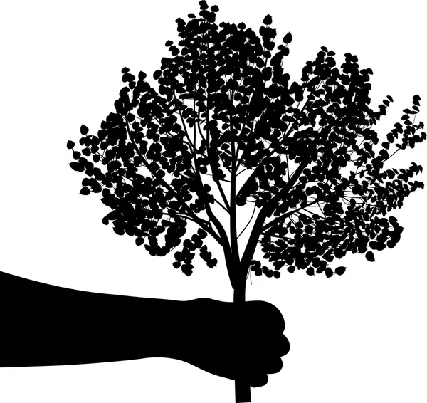 Czarny ludzką ręką gospodarstwie drzewo — Wektor stockowy