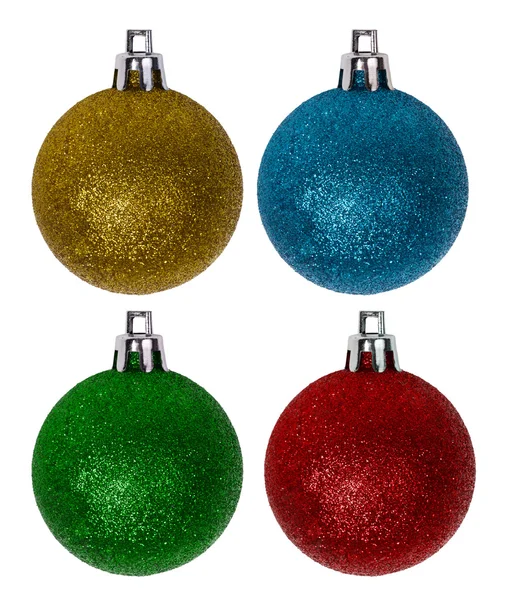 Four colors new-year tree decorations on white — Stock Photo, Image