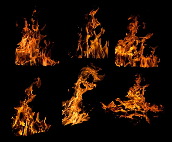 Set of orange flames isolated on black — Stock Photo, Image