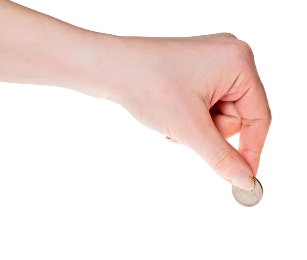 Menschliche Hand hält Münze isoliert auf weißem Papier — Stockfoto