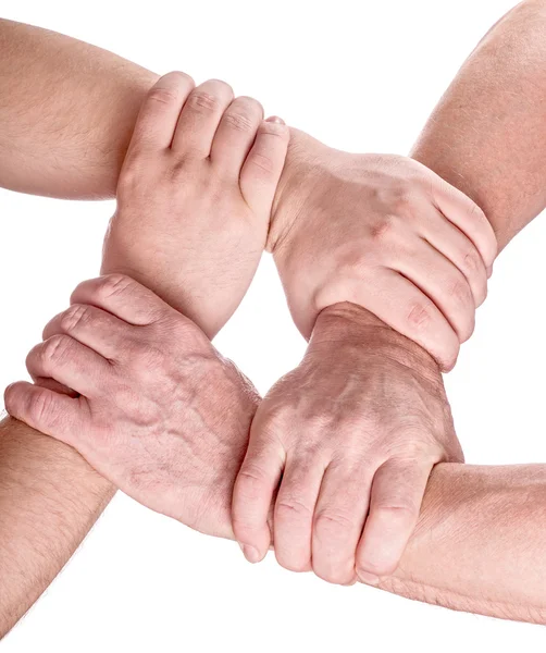 Vier man handen met elkaar — Stockfoto