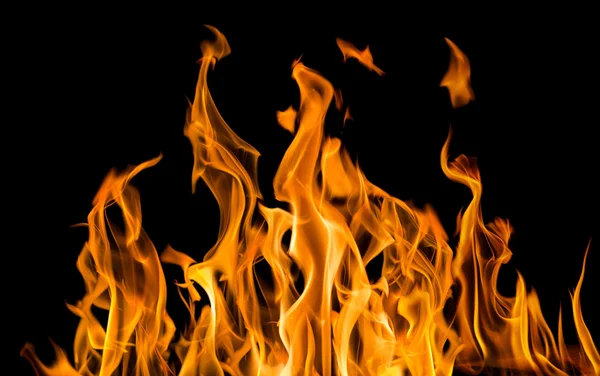 Yellow fire sparks isolated on black — Stock Photo, Image