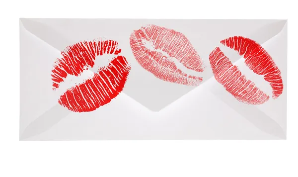 Light envelope with red lips imprints on white — Stock Photo, Image