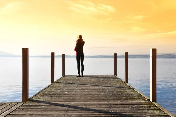 Girl on the pier. Lake of Zug, Switzerland — Stock Photo, Image