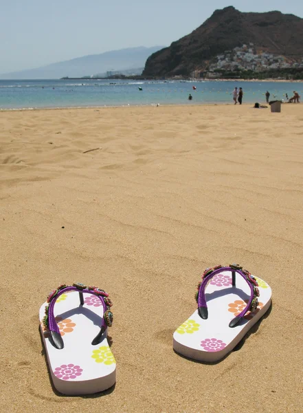 Flip-flops on the sand of Teresitas beach. Tenerife island, Cana — Stock Photo, Image
