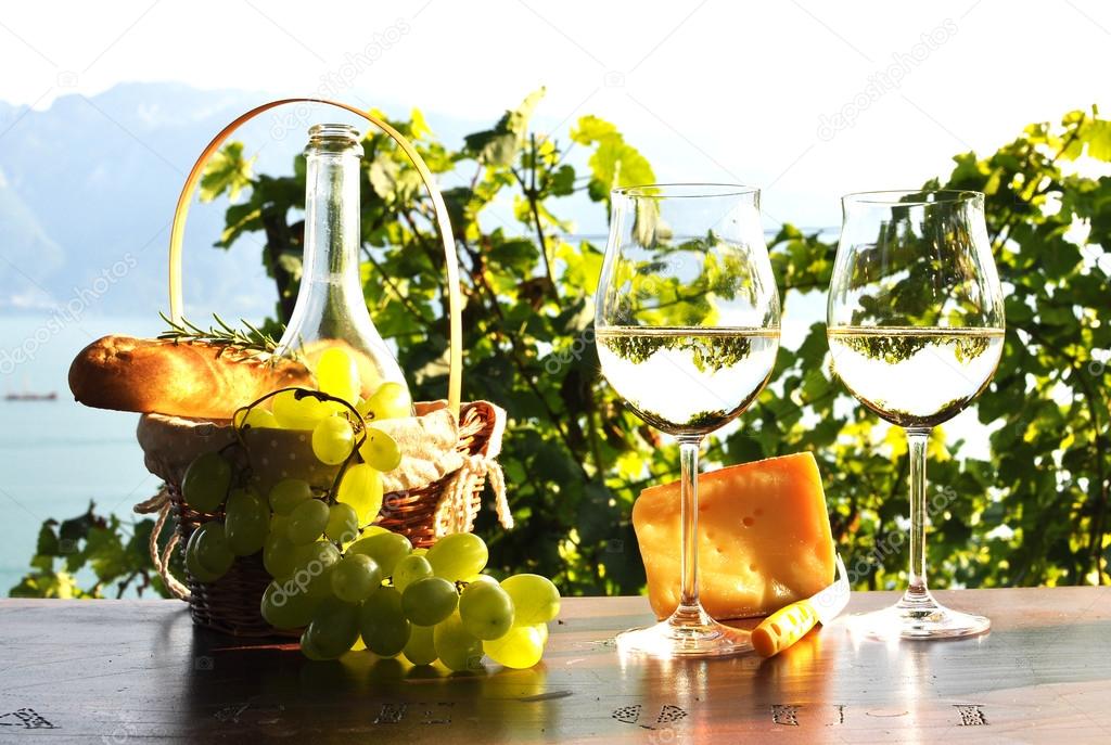 Wine, grapes, bread and cheese. Lavaux region, Switzerland