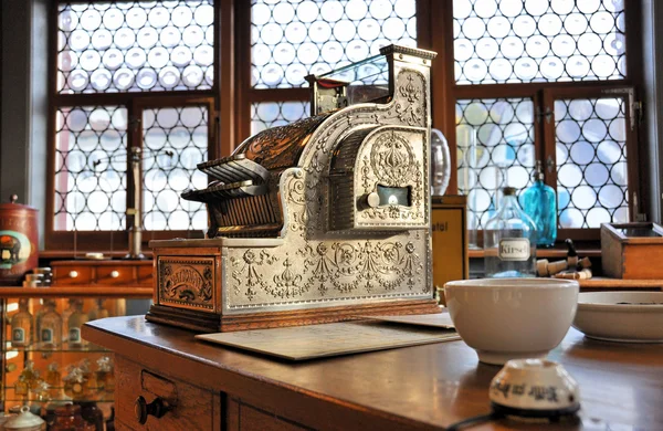 Vintage cash register in an old pharmacy — Stock Photo, Image