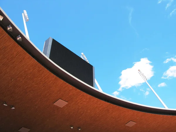 Roof of a stadium and scoreboard — Stock Photo, Image