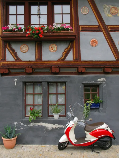 Trendy moped against old building. Fribourg, Switzerland — Stock Photo, Image