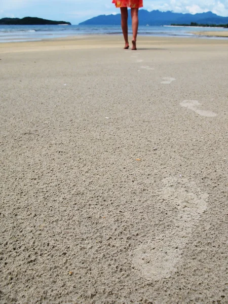 Footmarks on a sandy beach — Stock Photo, Image