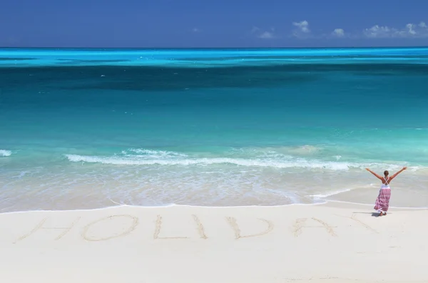 Vakantie schrijven op het verlaten strand van exuma, bahamas — Stockfoto