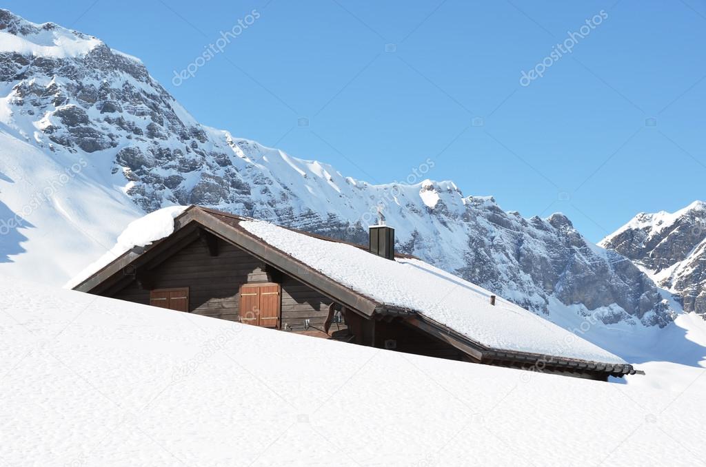 Farm house buried under snow, Melchsee-Frutt, Switzerland