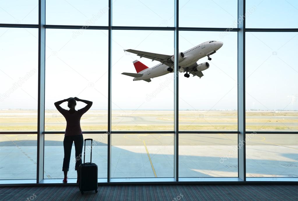 Girl at the airport window