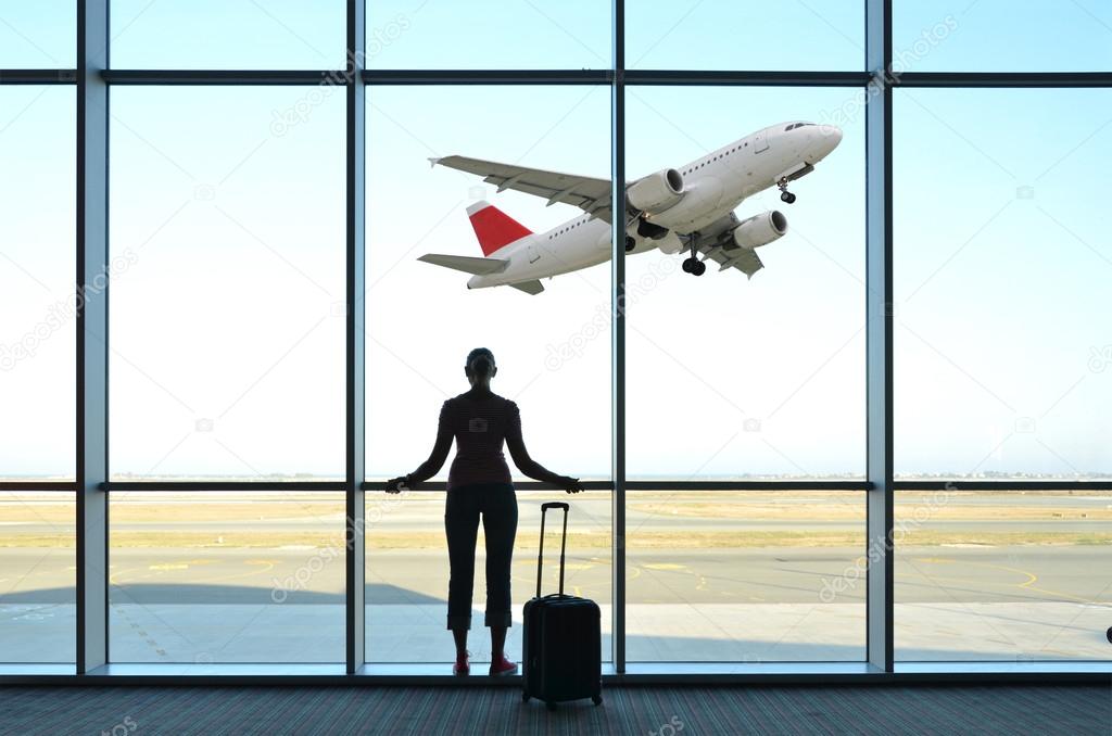 Girl at the airport window