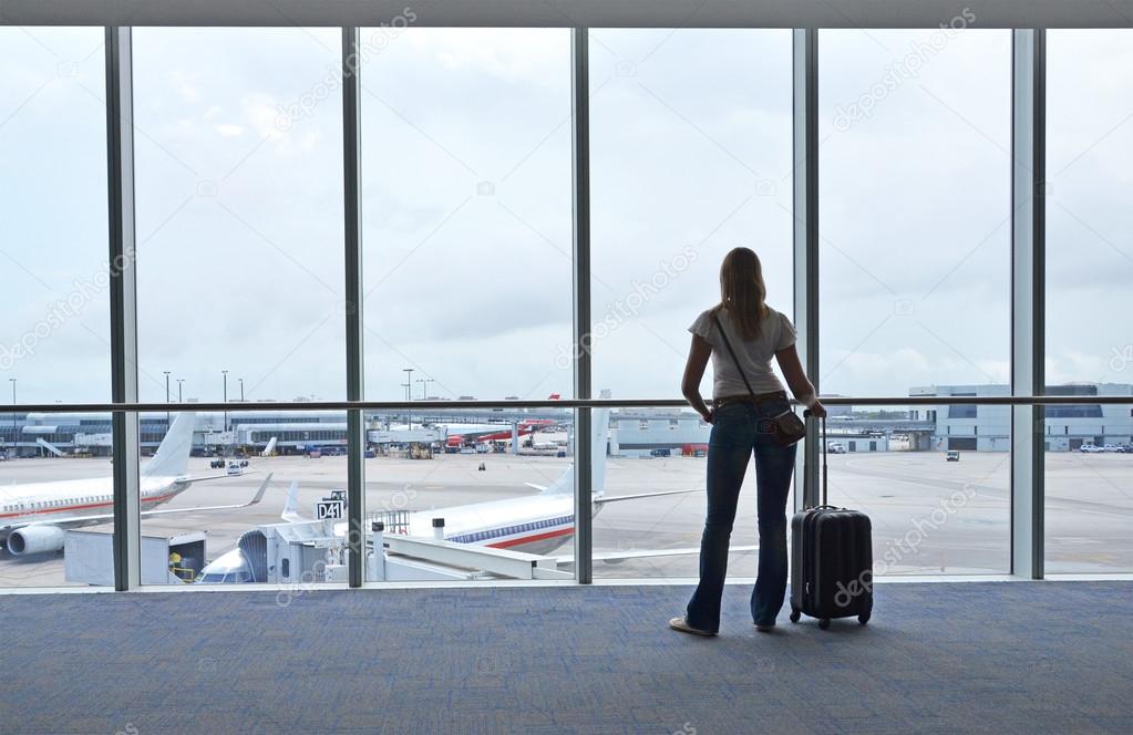 Girl at the airport window