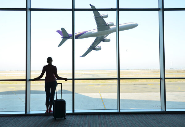 Girl at the airport window