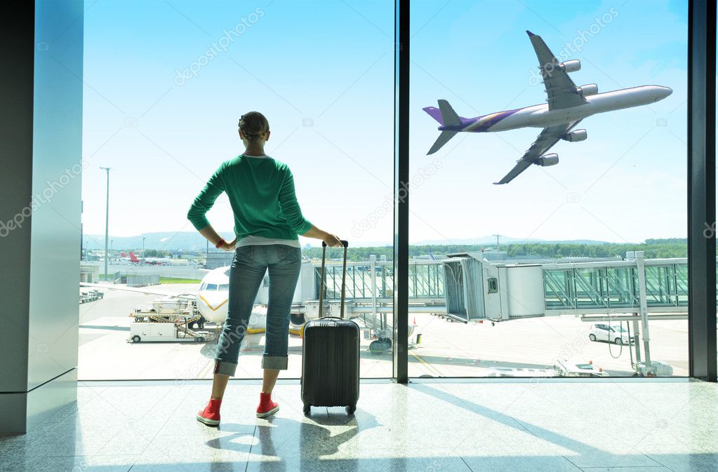 Girl at the airport window