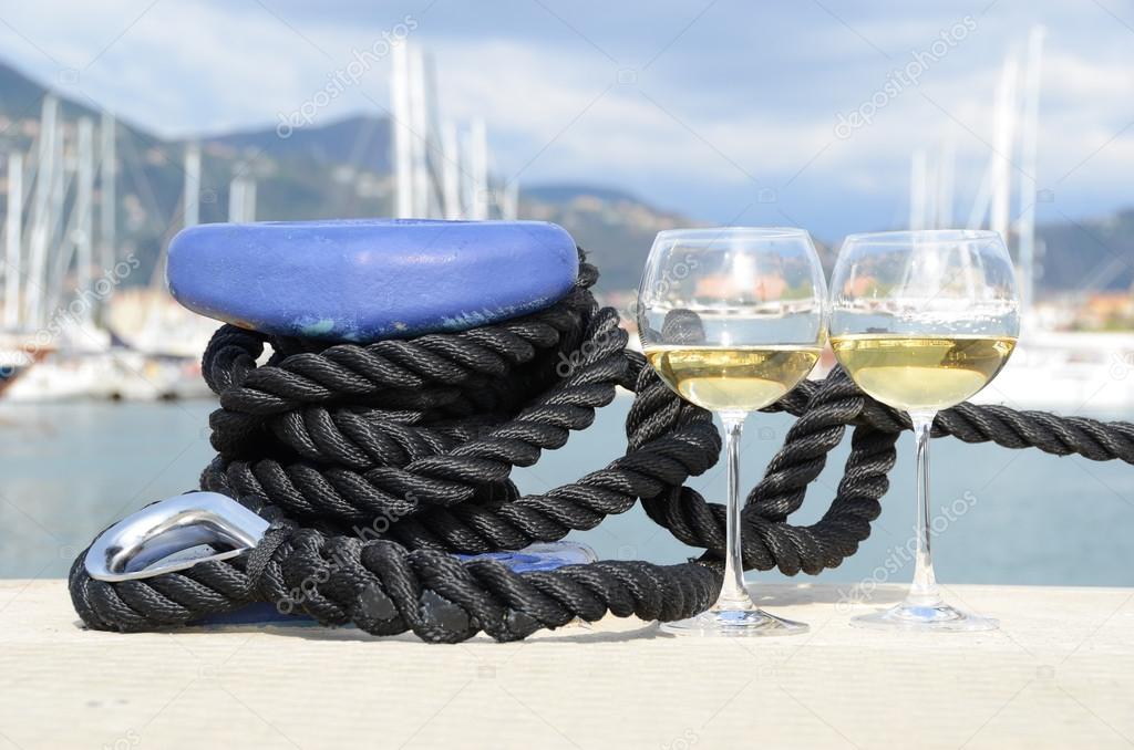 Wineglasses against yachts