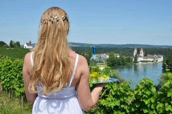 Girl holding wine and grapes — Stock Photo, Image