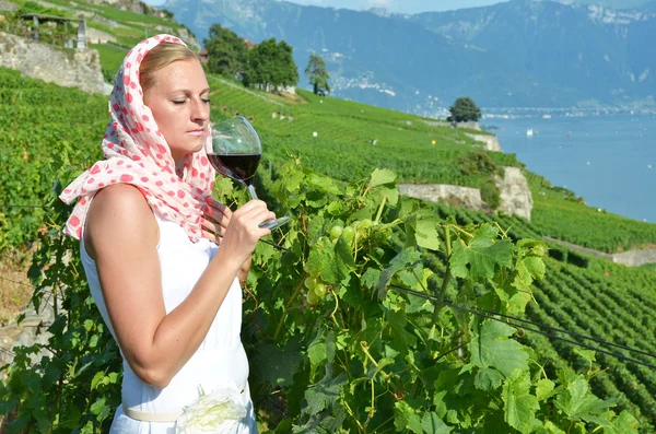 Girl tasting red wine — Stock Photo, Image