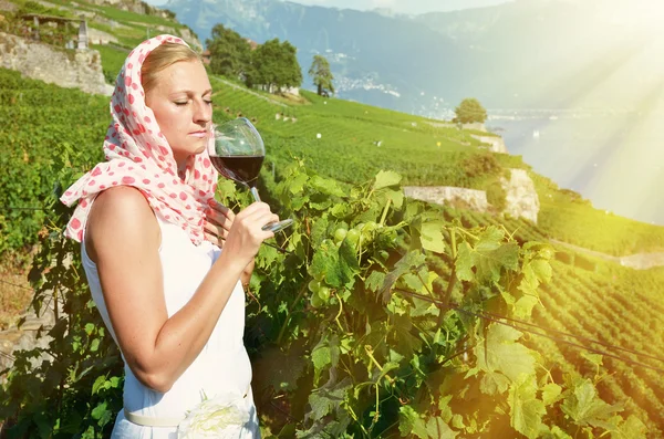 Girl tasting red wine — Stock Photo, Image