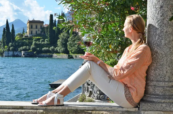 Girl with a glass of wine — Stock Photo, Image