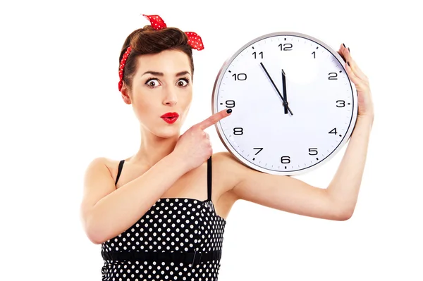 Pin-up girl on white background holding clock — Stock Photo, Image