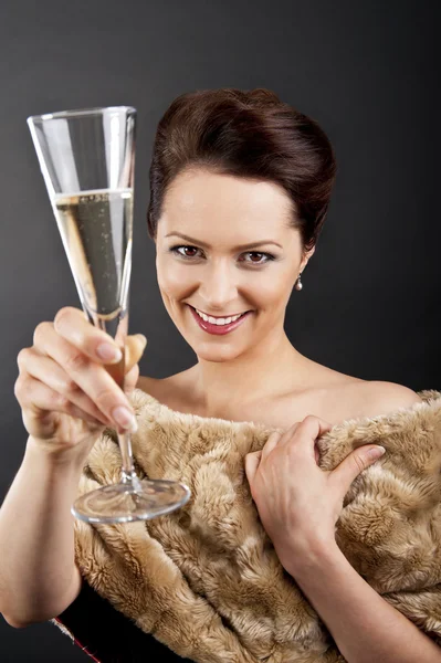 Woman with champagne flute — Stock Photo, Image