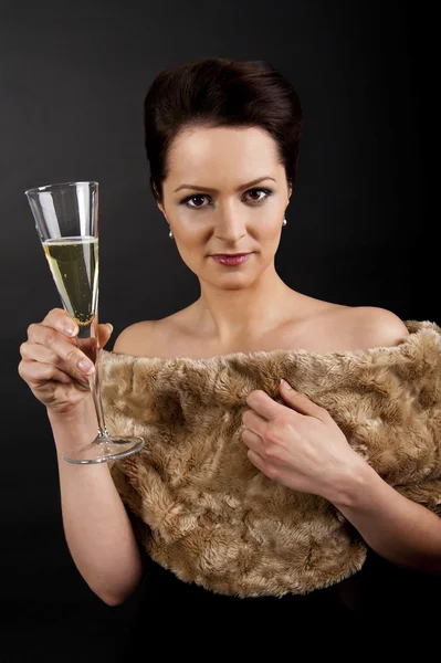 Woman with champagne flute — Stock Photo, Image