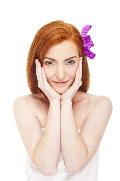 Woman in towel with flower in her red hair — Stock Photo, Image