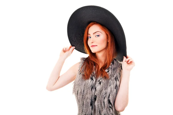 Photo of beautiful woman on a black fashion hat. Studio portrait — Stock Photo, Image