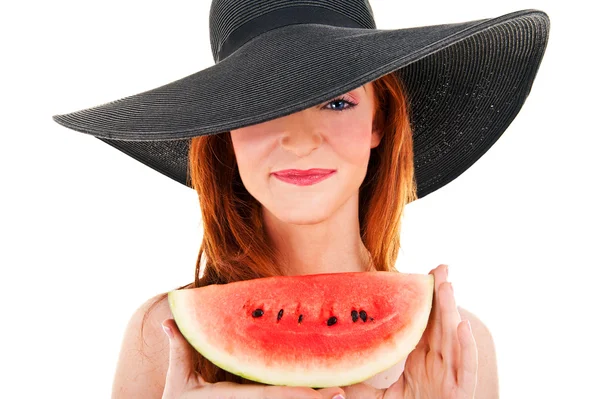 Beautiful woman with watermelon and black hat — Stock Photo, Image