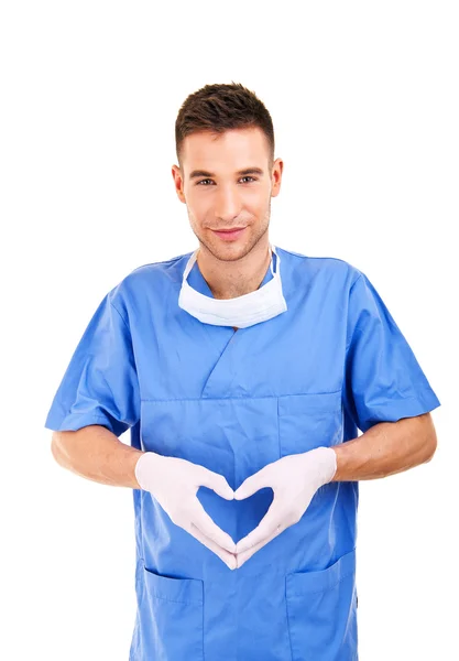 Close up of doctor's hands making heart shape isolated on — Stock Photo, Image