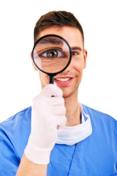 Doctor with magnifier and mask — Stock Photo, Image