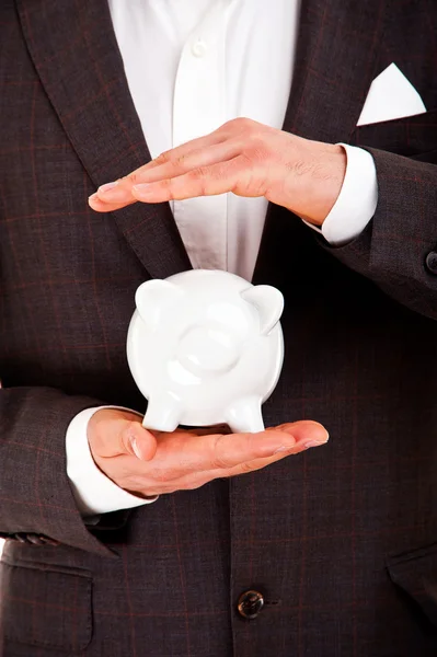 Business man and piggy bank isolated on white background — Stock Photo, Image