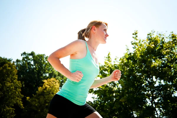 Young lady running — Stock Photo, Image