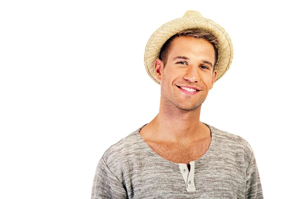 Portrait of a man staring at the camera. He is wearing a hat and — Stock Photo, Image