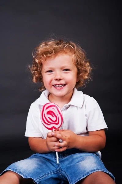 Bambino con lecca-lecca — Foto Stock