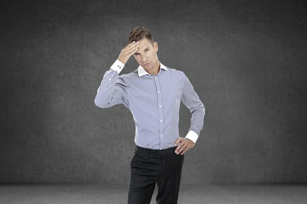 Young handsome confused businessman — Stock Photo, Image