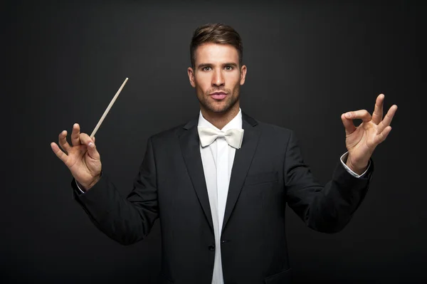 Man conducting an orchestra — Stock Photo, Image