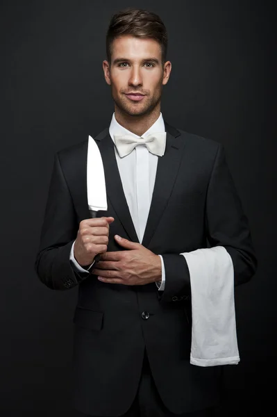 Professional waiter with knife in hand — Stock Photo, Image