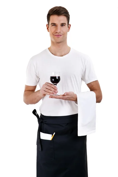 Smiling waiter serving red wine . isolated on white background — Stock Photo, Image