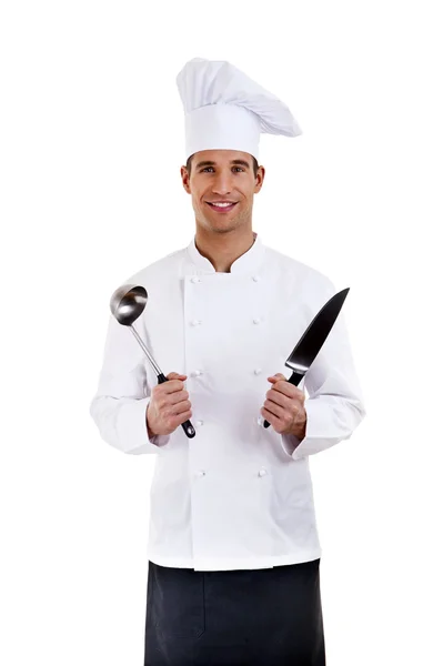 Chef. Isolated over white background. Holding knife and spoon — Stock Photo, Image