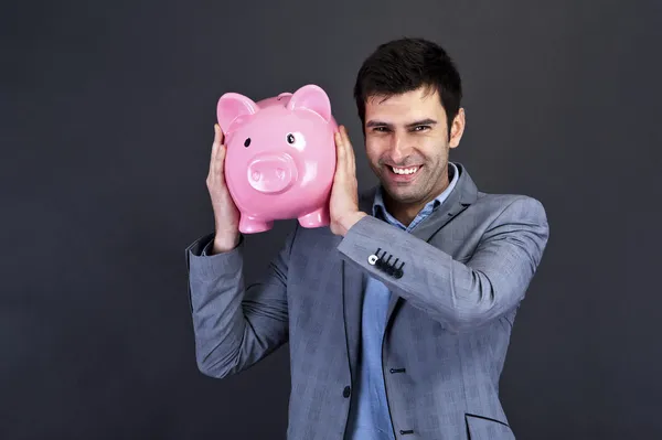 Portrait of a serious businessman with smile — Stock Photo, Image