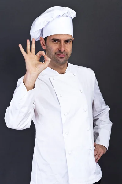 Portriat des Kochs vor dunklem Hintergrund — Stockfoto