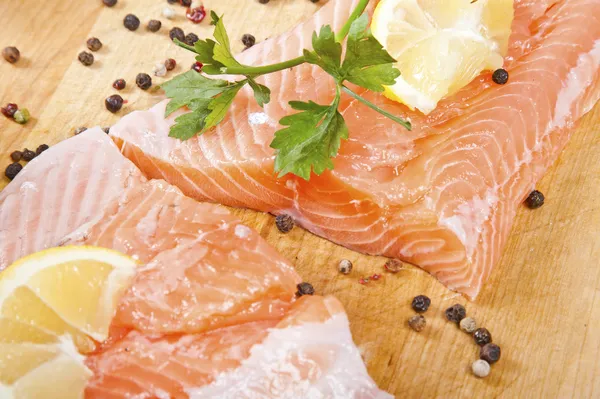 Salmon fillet with rosemary and lemon — Stock Photo, Image